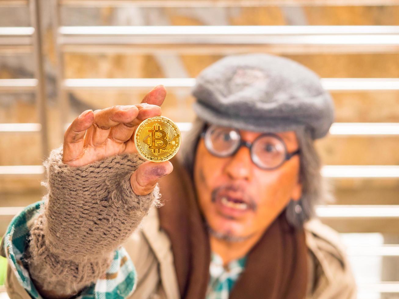 A poor homeless man are shocked to receive donations as bitcoin photo