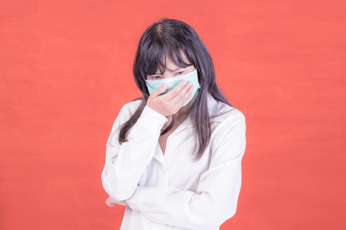 Asian business women have to use a mask to cover the face to prevent pollution from dust photo