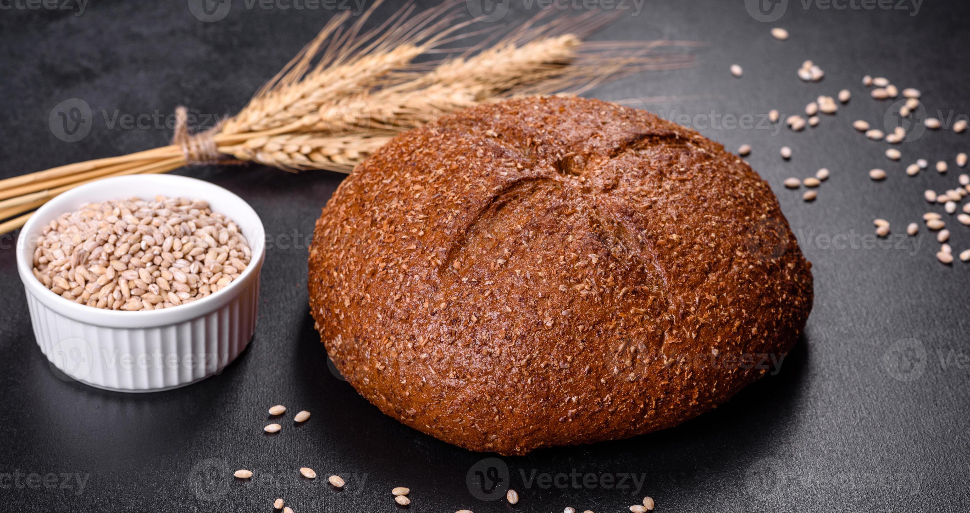Fresh baked brown bread with ears and grains of wheat 7261110 Stock
