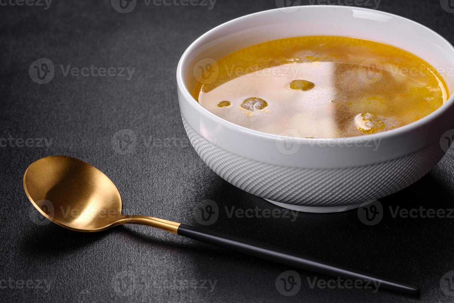 Soup with turkey meatballs, potatoes and vegetables. Selective focus photo
