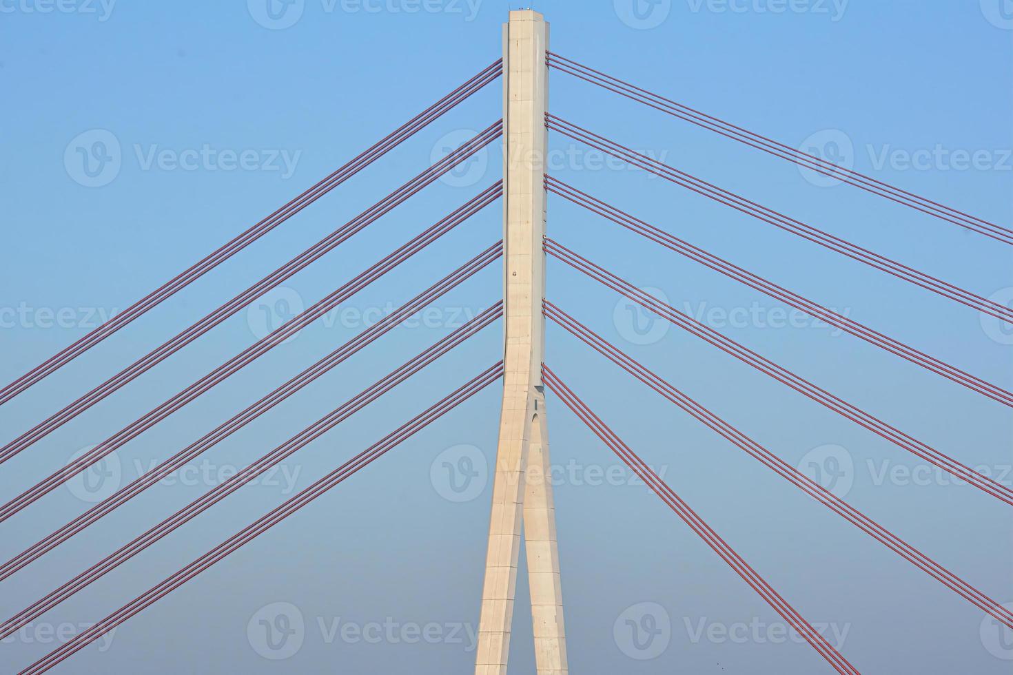 pylon bridge over blue sky photo