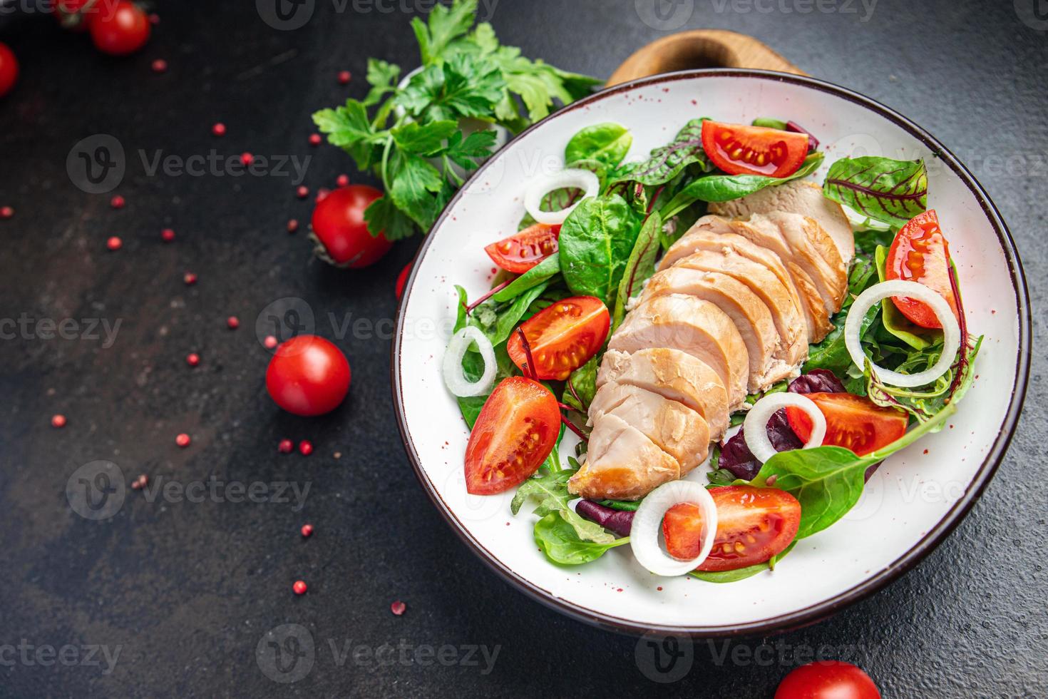 chicken salad vegetable tomato, chicken breast, onion, green mix leaves lettuce fresh meal food snack on the table photo