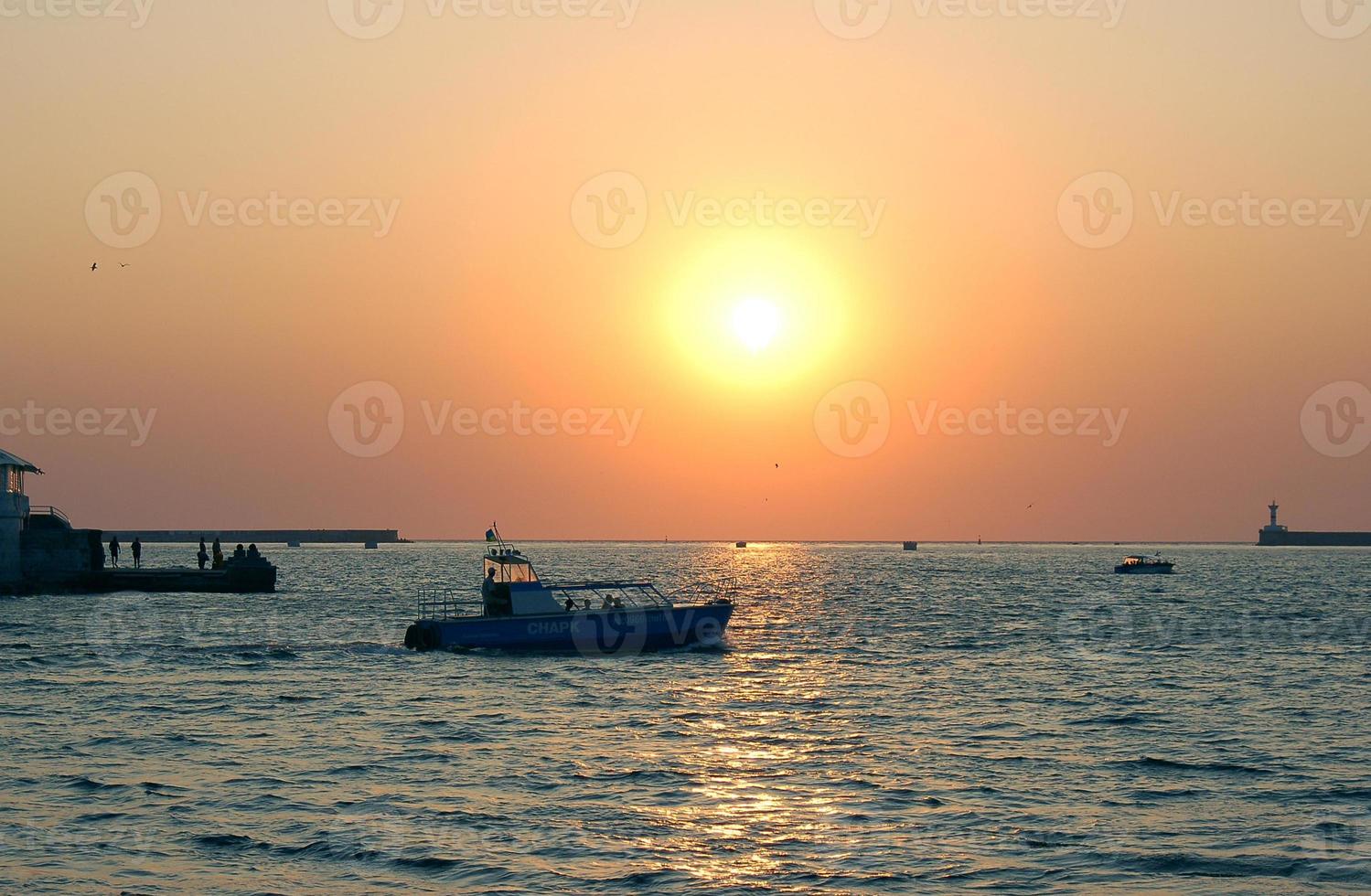 sunset on sea photo