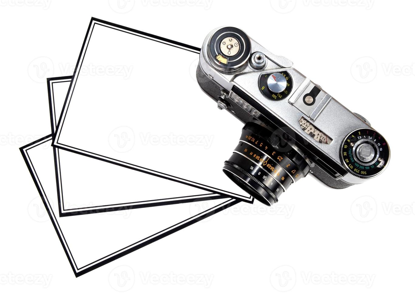 old retro photo camera and blank photo 7279875 Stock Photo at Vecteezy