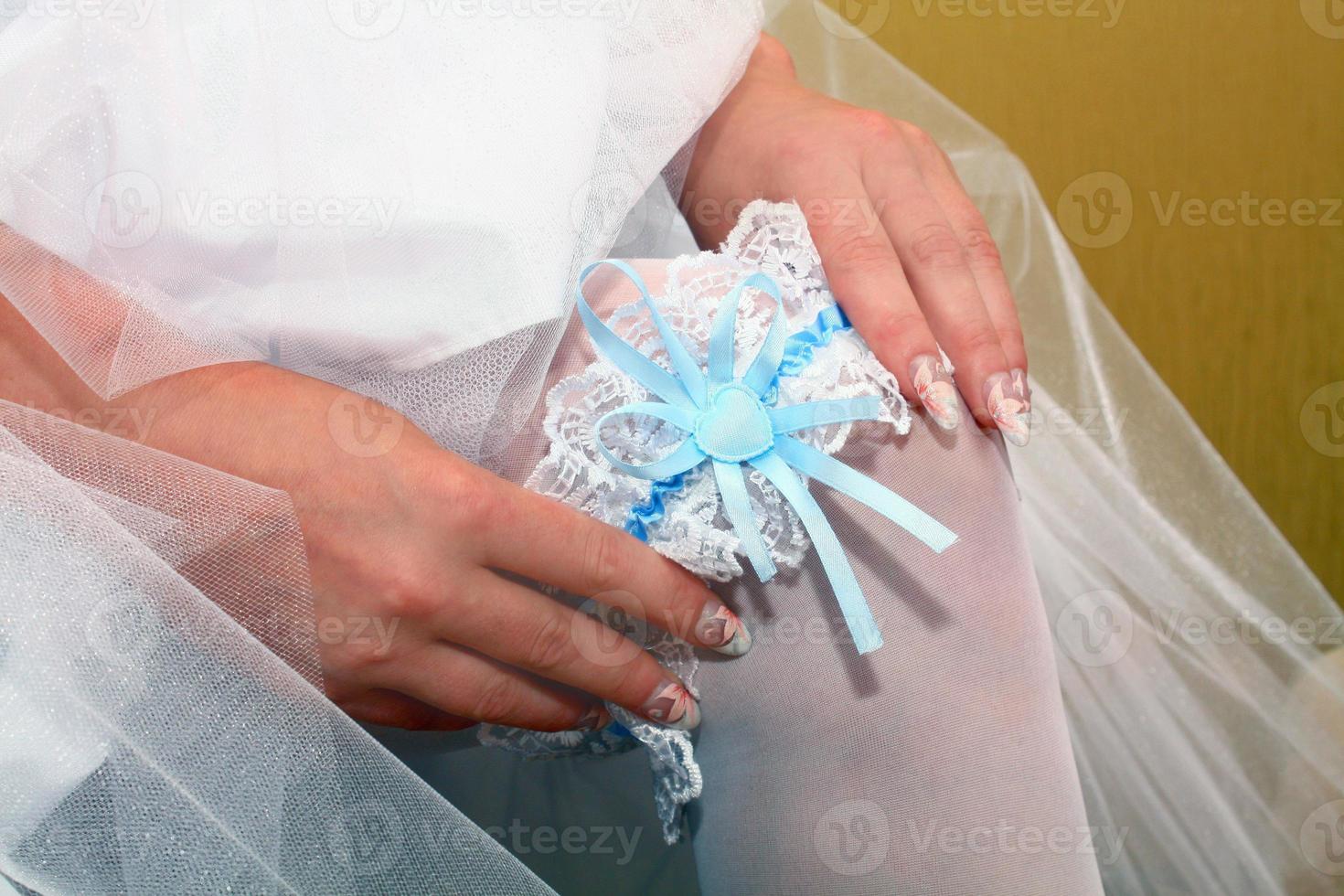 garter on bride leg photo