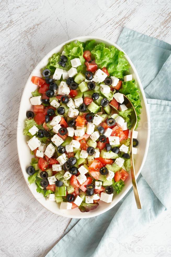 Greek salad Horiatiki with feta cheese, vegeterian mediterranean food, low calories diet photo