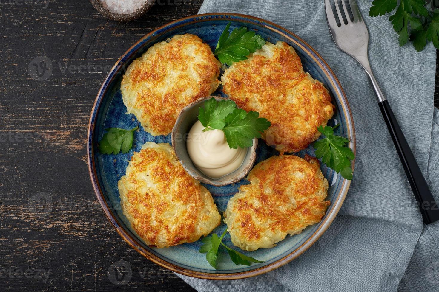 Hashbrown, hash brown potatoes fried pancakes, traditional american cuisine. photo