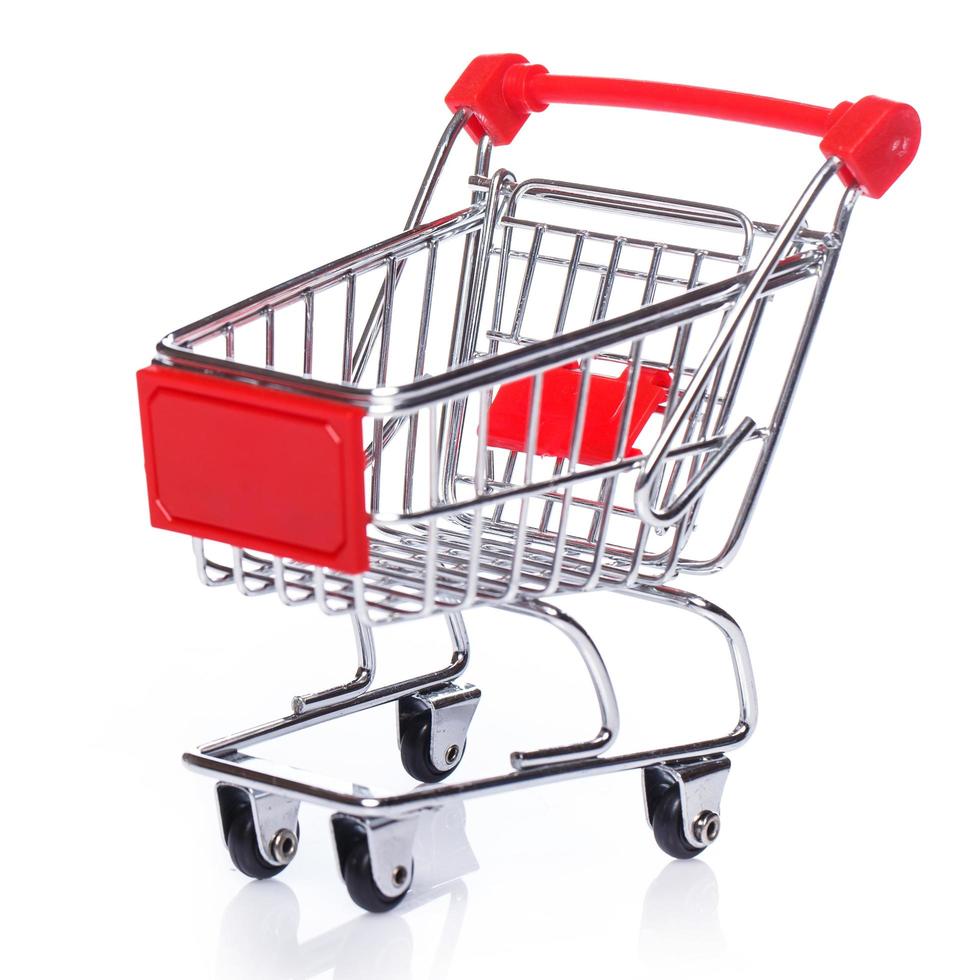 Shopping trolley on white background photo