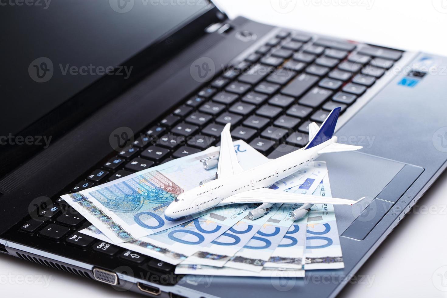 Aircraft and banknotes photo