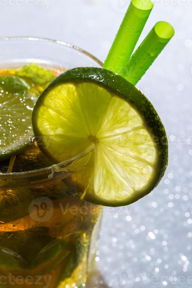 Fresh ice tea with lime photo