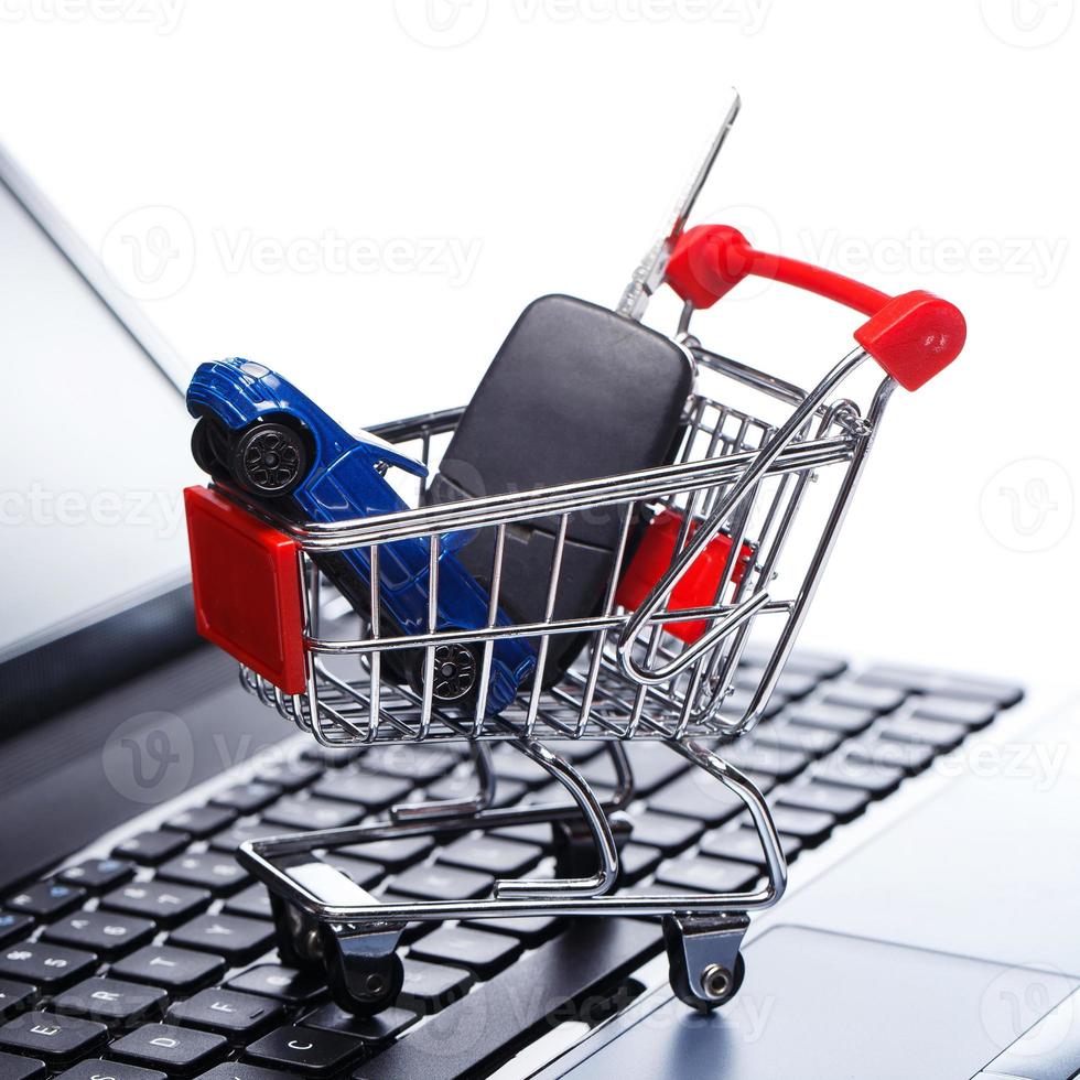 Car and key in shopping trolley photo