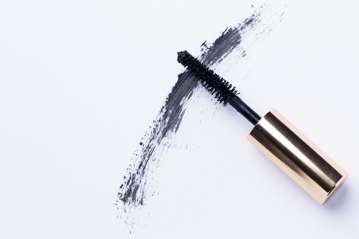 Mascara brush on white photo