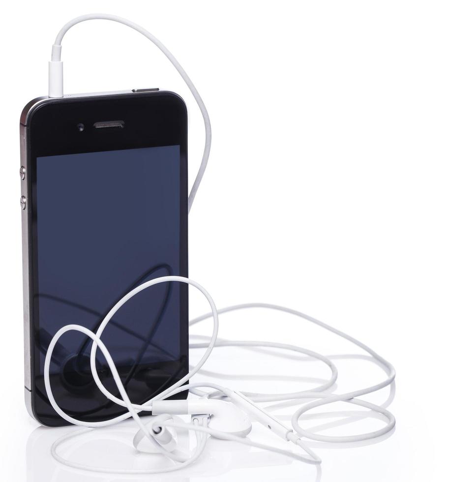 Smartphone and earphones photo