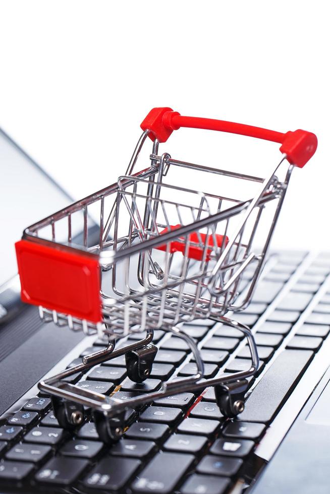 Shopping trolley over keyboard photo