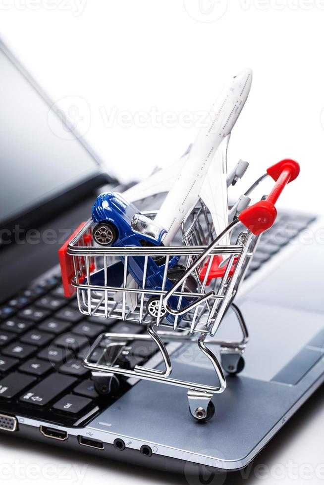 Aircraft and car in shopping trolley photo