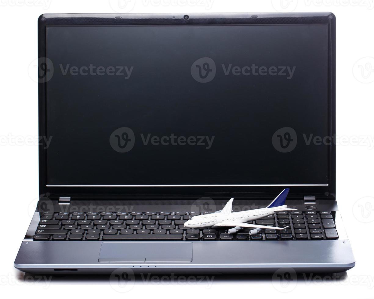 Aircraft over laptop keyboard photo