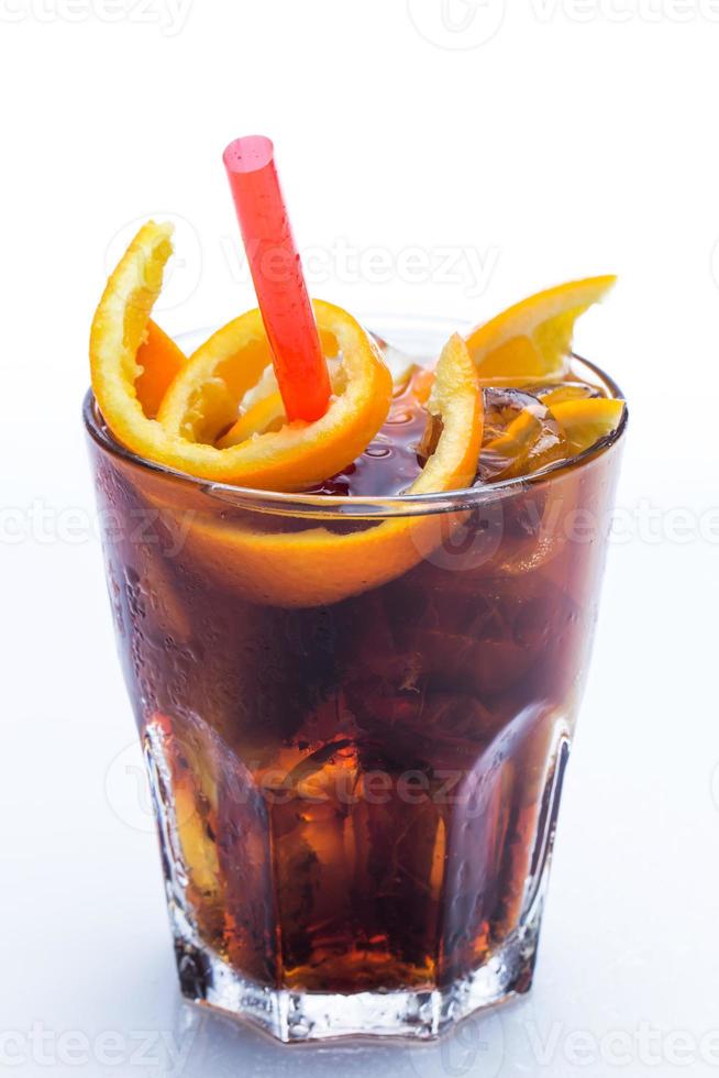 Cold cocktail with orange fruit photo