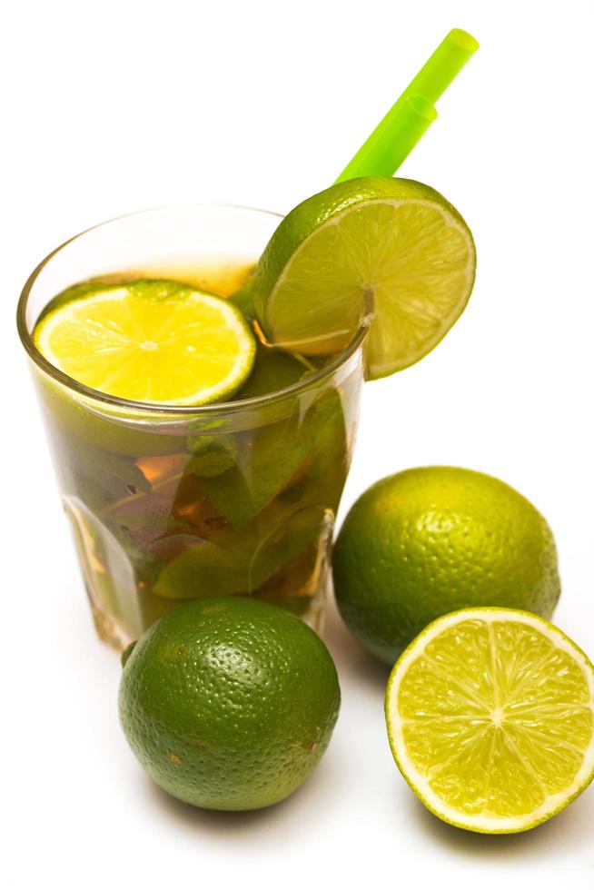 Glass of fresh ice tea with lime photo