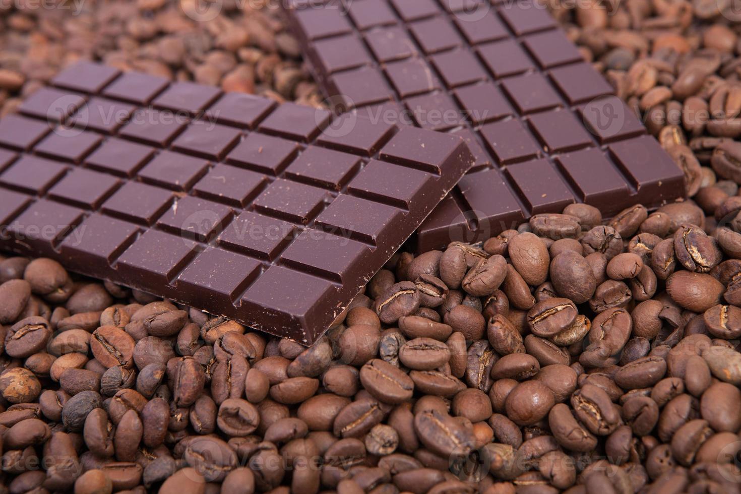 Cup of coffee on the coffee beans background photo