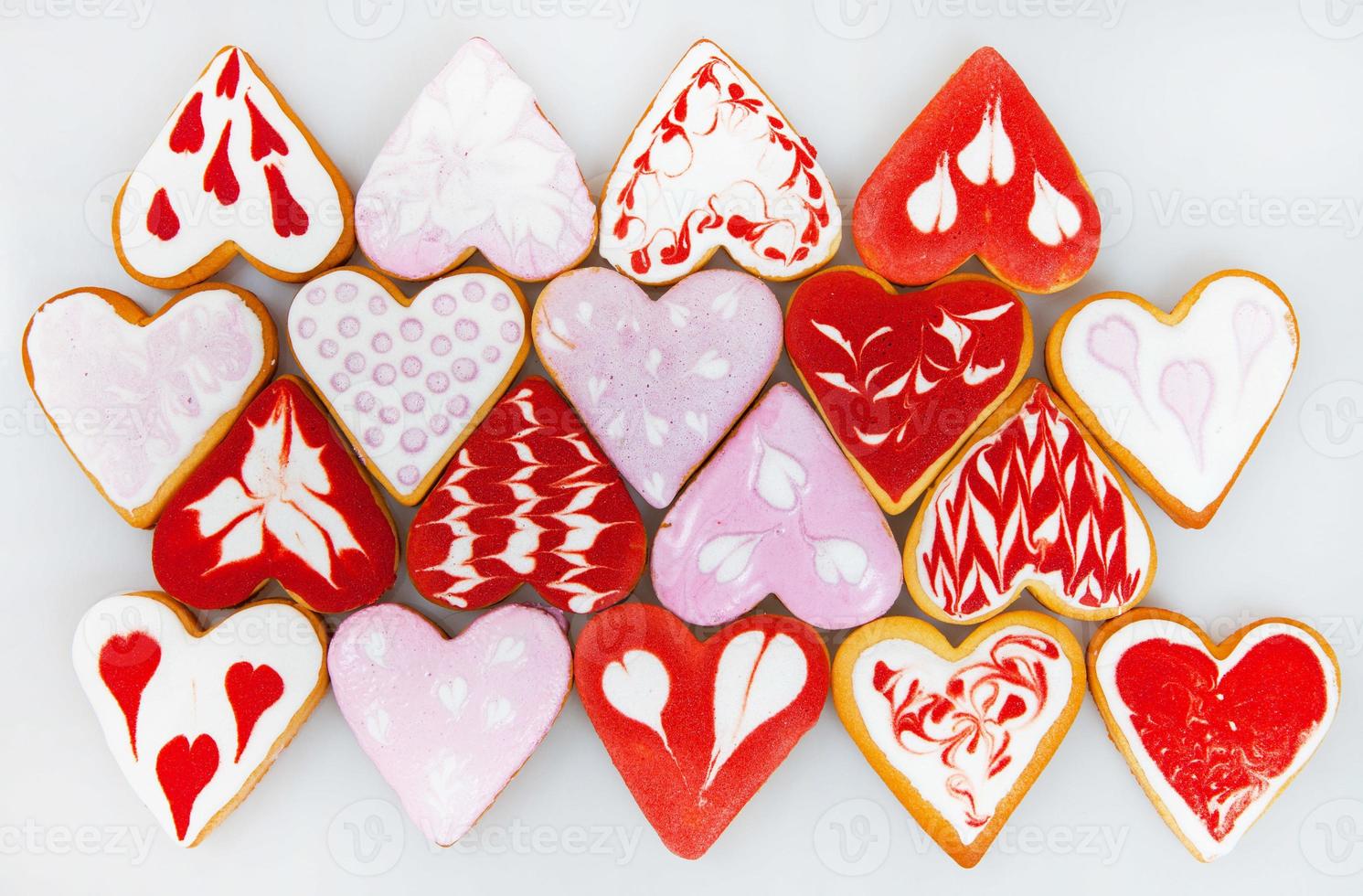 Valentine  day cookies. Heart shaped cookies for valentine day. Red and Pink Heart Shaped Cookies. Romantic seamless pattern with cookies hearts. photo