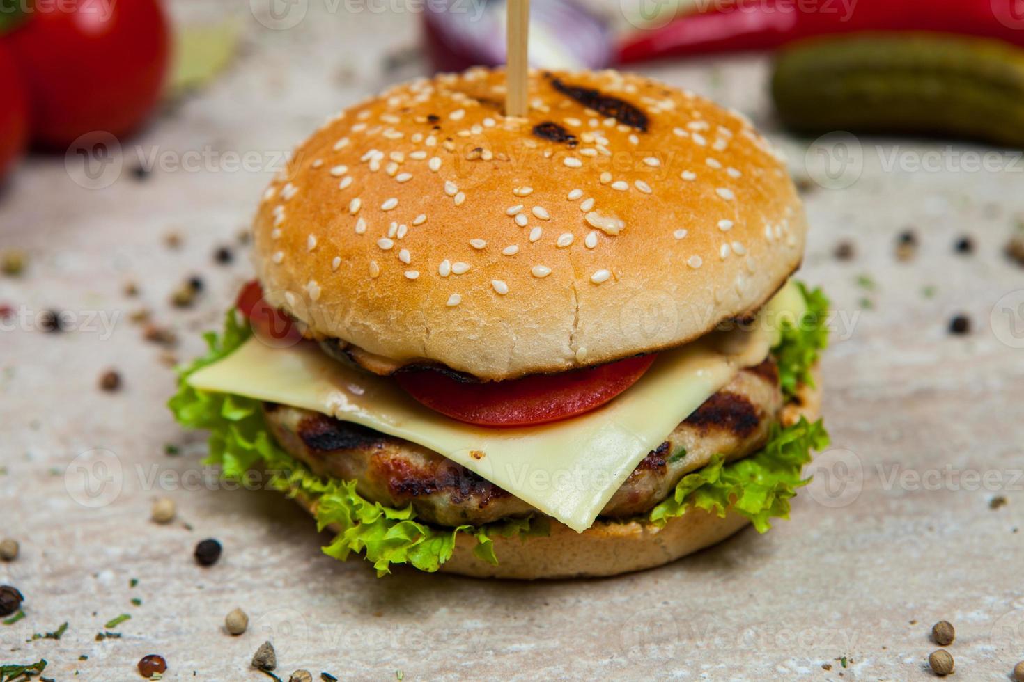 Top view hamburger on the wooden background . Hamburger, homemade hamburger with fresh vegetables.Beef burger. photo