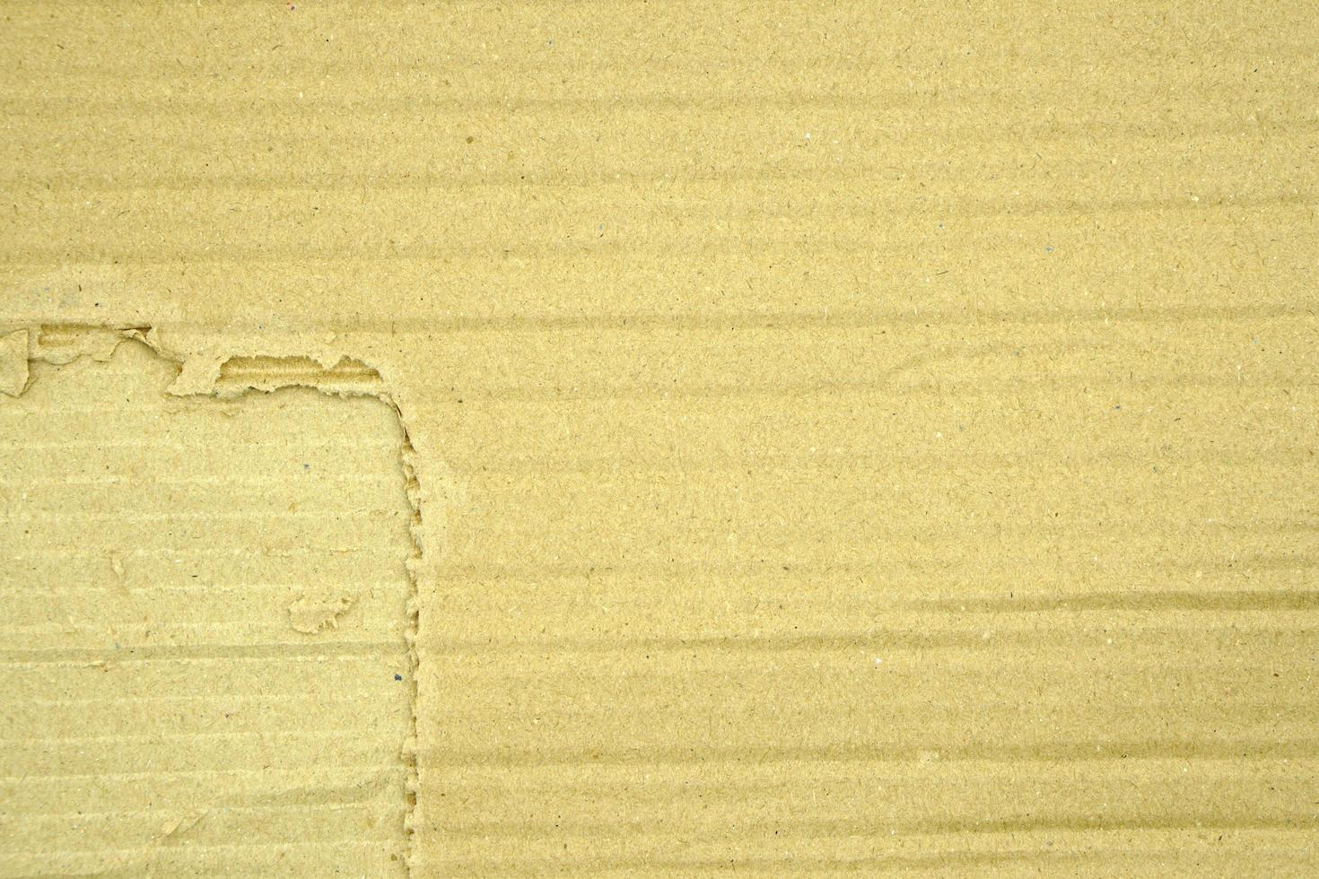 Paper brown texture light rough textured spotted blank copy space background in yellow photo