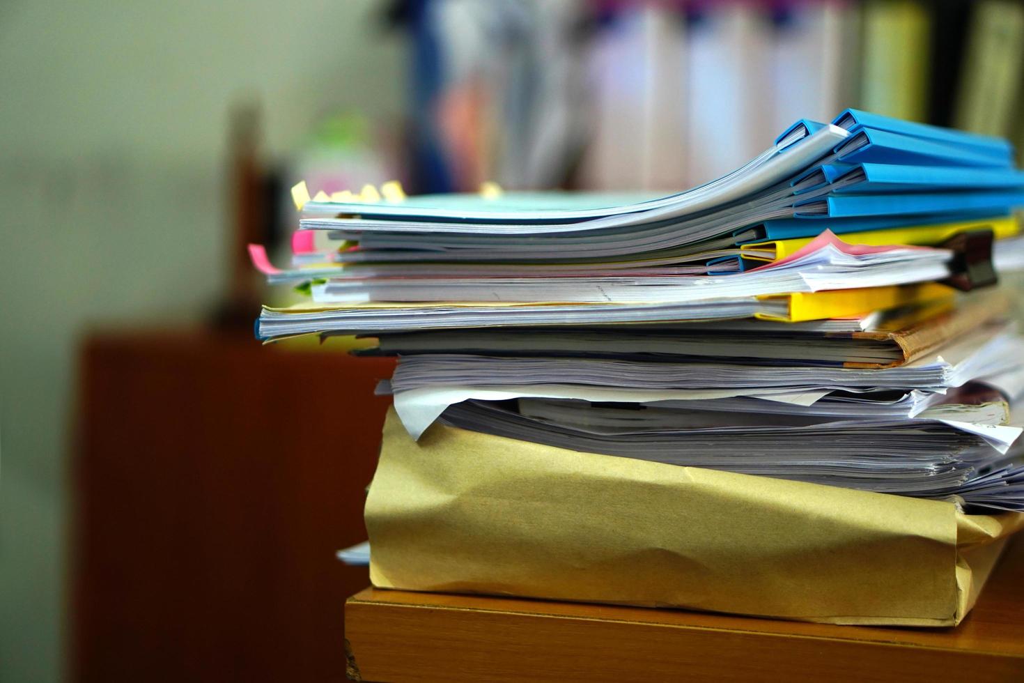 stack of papers on the desk photo