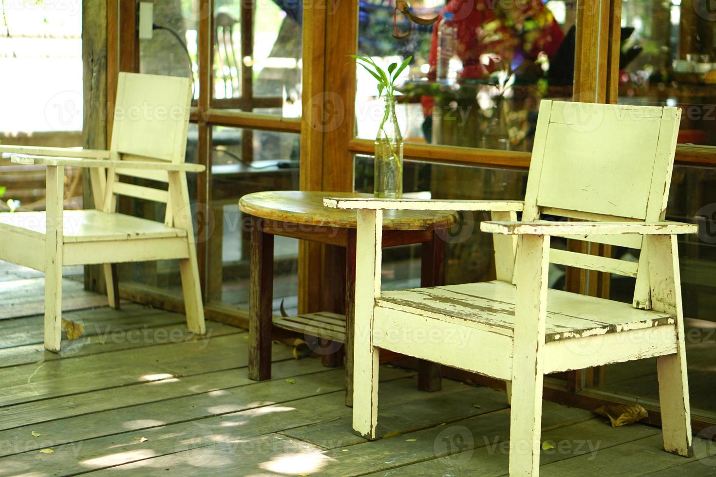 Wooden table for relaxing in the coffee shop photo