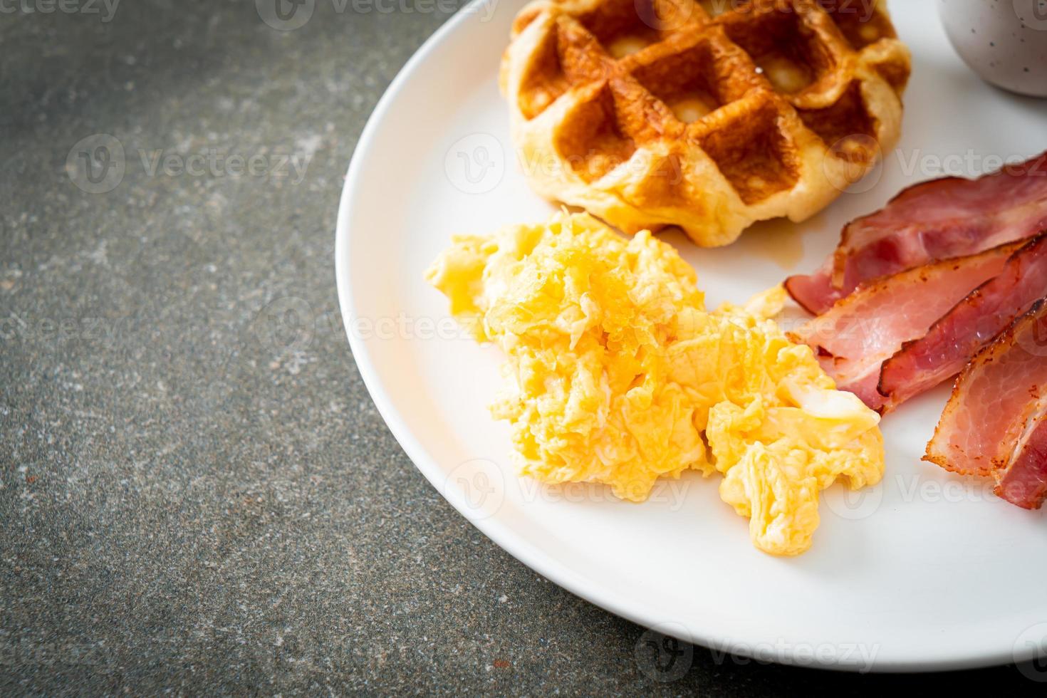 scrambled egg with bacon and waffle photo