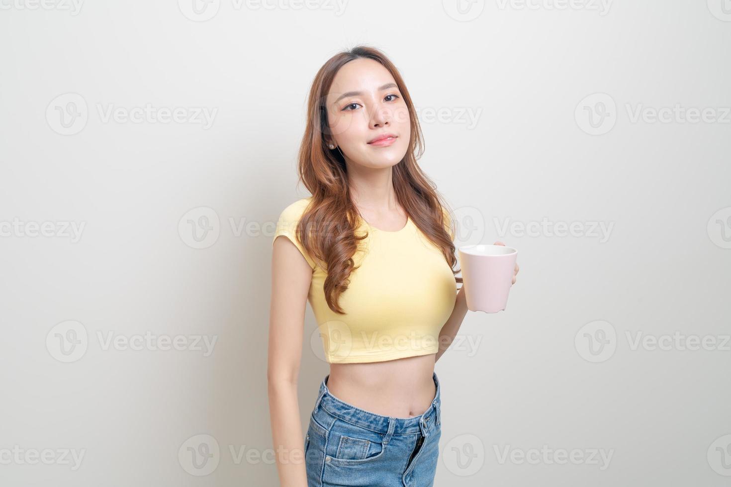 portrait beautiful Asian woman holding coffee cup or mug photo