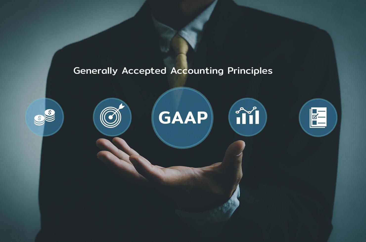 Hand businessman icon GAAP Generally Accepted Accounting Principles  virtual screen.Business financial Concept. photo