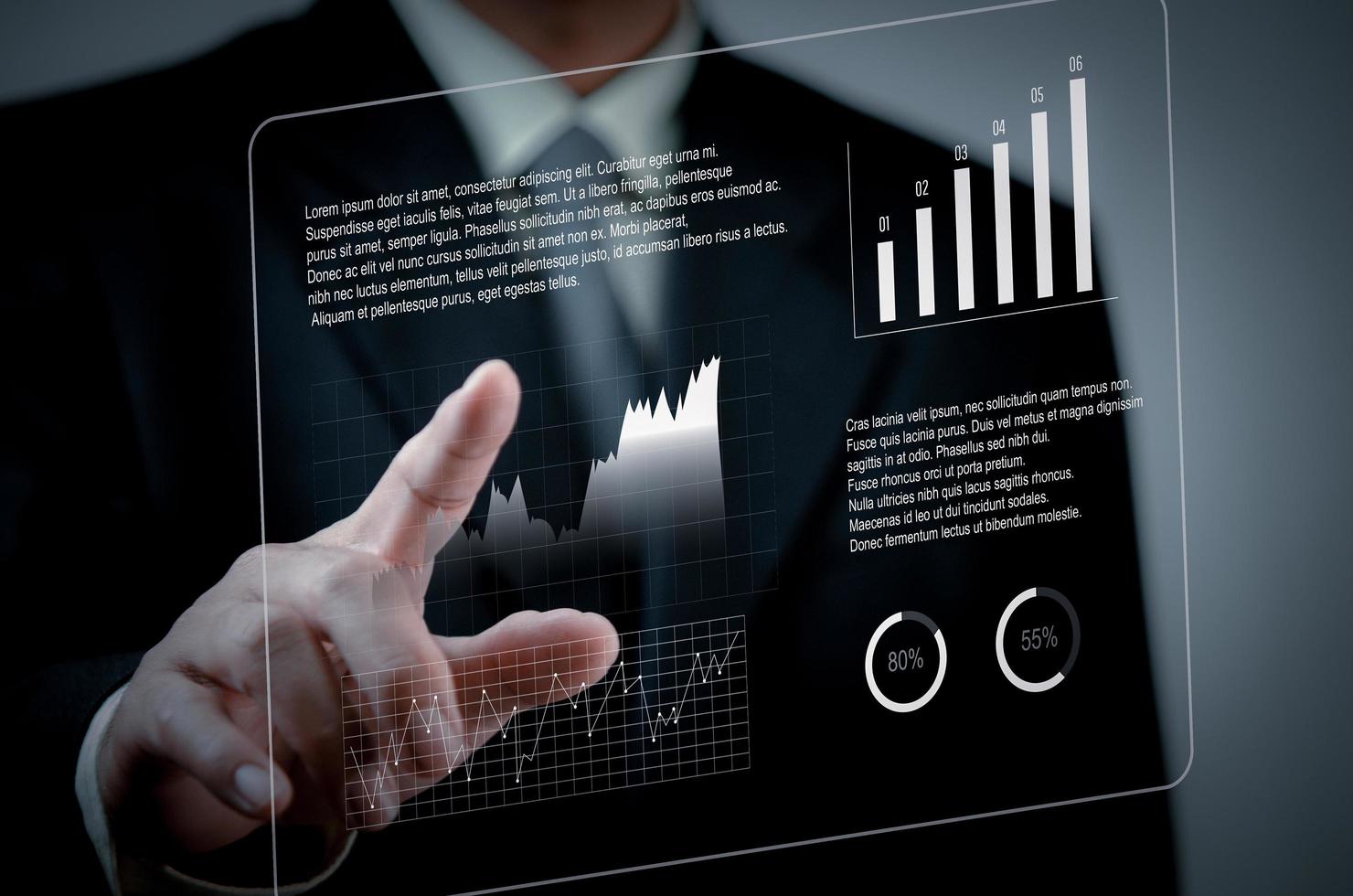 Hand touching virtual screen graph and chart data analysis and big data business concept. photo