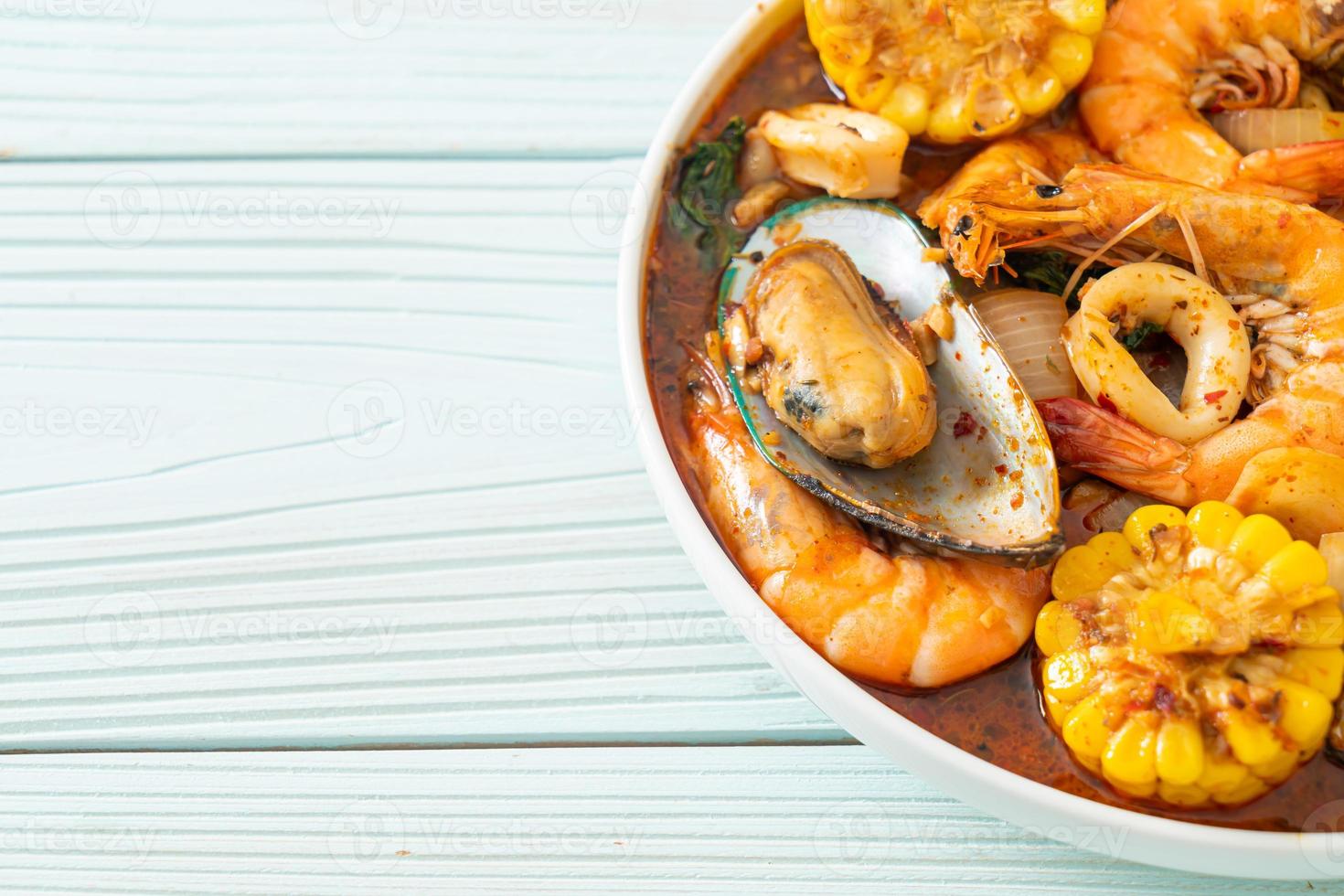 spicy barbecue seafood - shrimps, sqiud, mussel photo