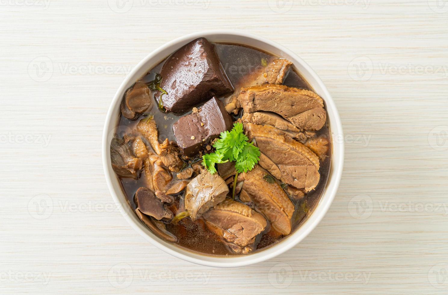 Pot-stewed ducks or Steamed duck with soy sauce and spices photo