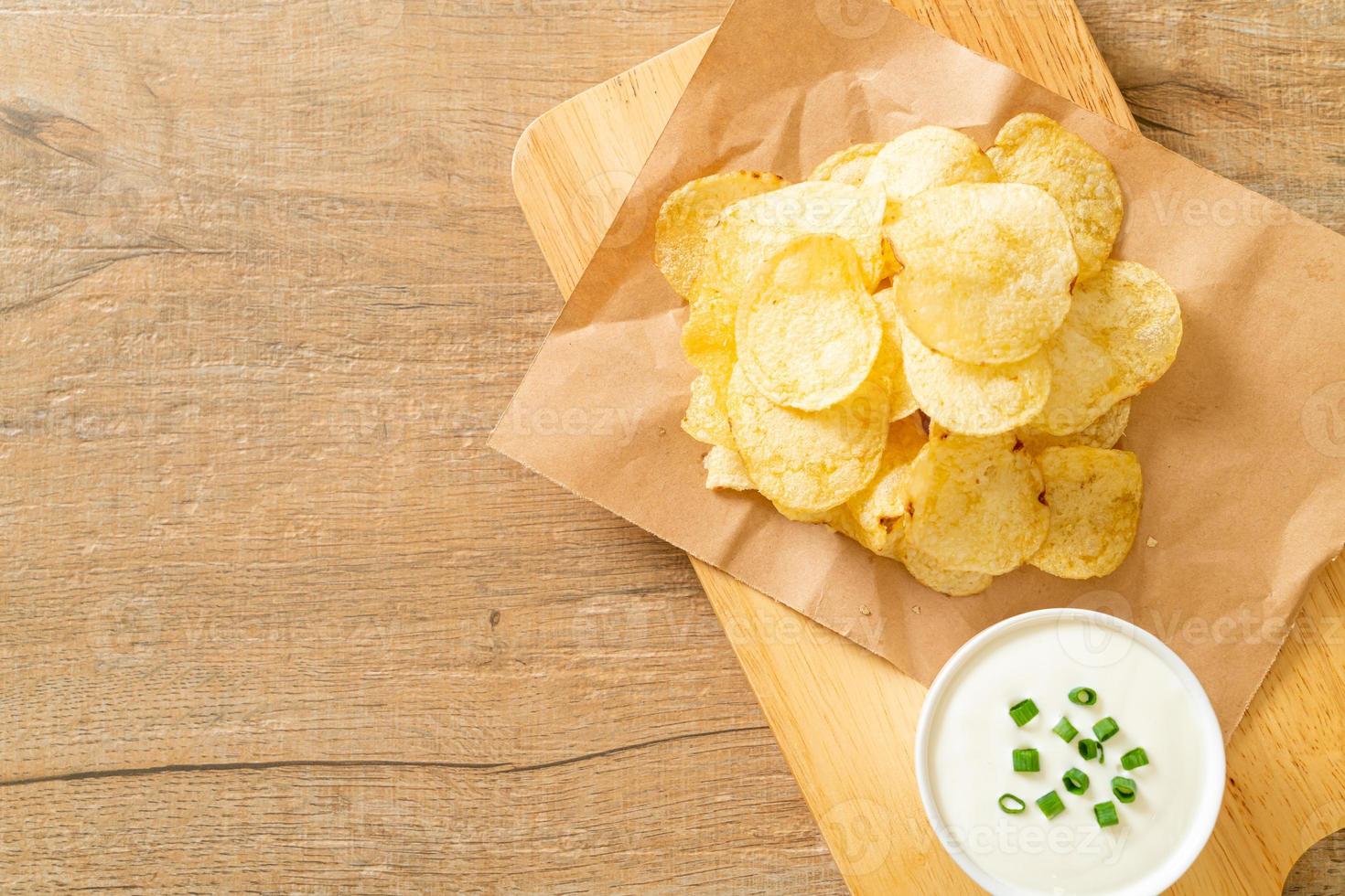 papas fritas con crema agria foto