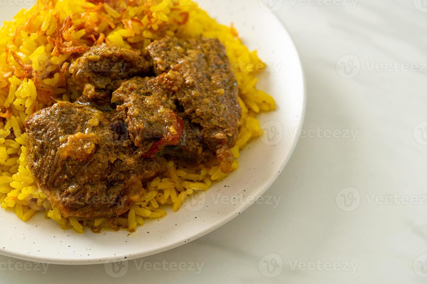 Beef Biryani or Curried rice and beef - Thai-Muslim version of Indian biryani, with fragrant yellow rice and beef photo