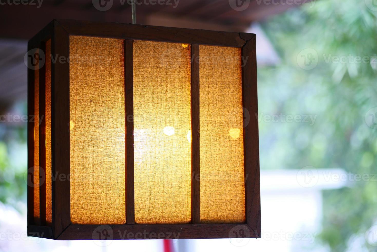 a glowing lamp in a nature with copy space photo