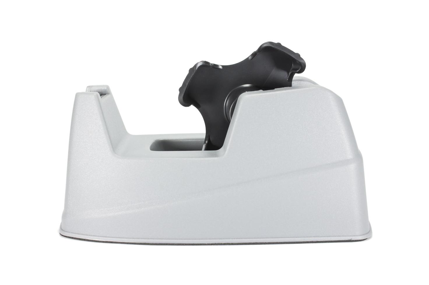 A typical tape dispenser on a white surface photo