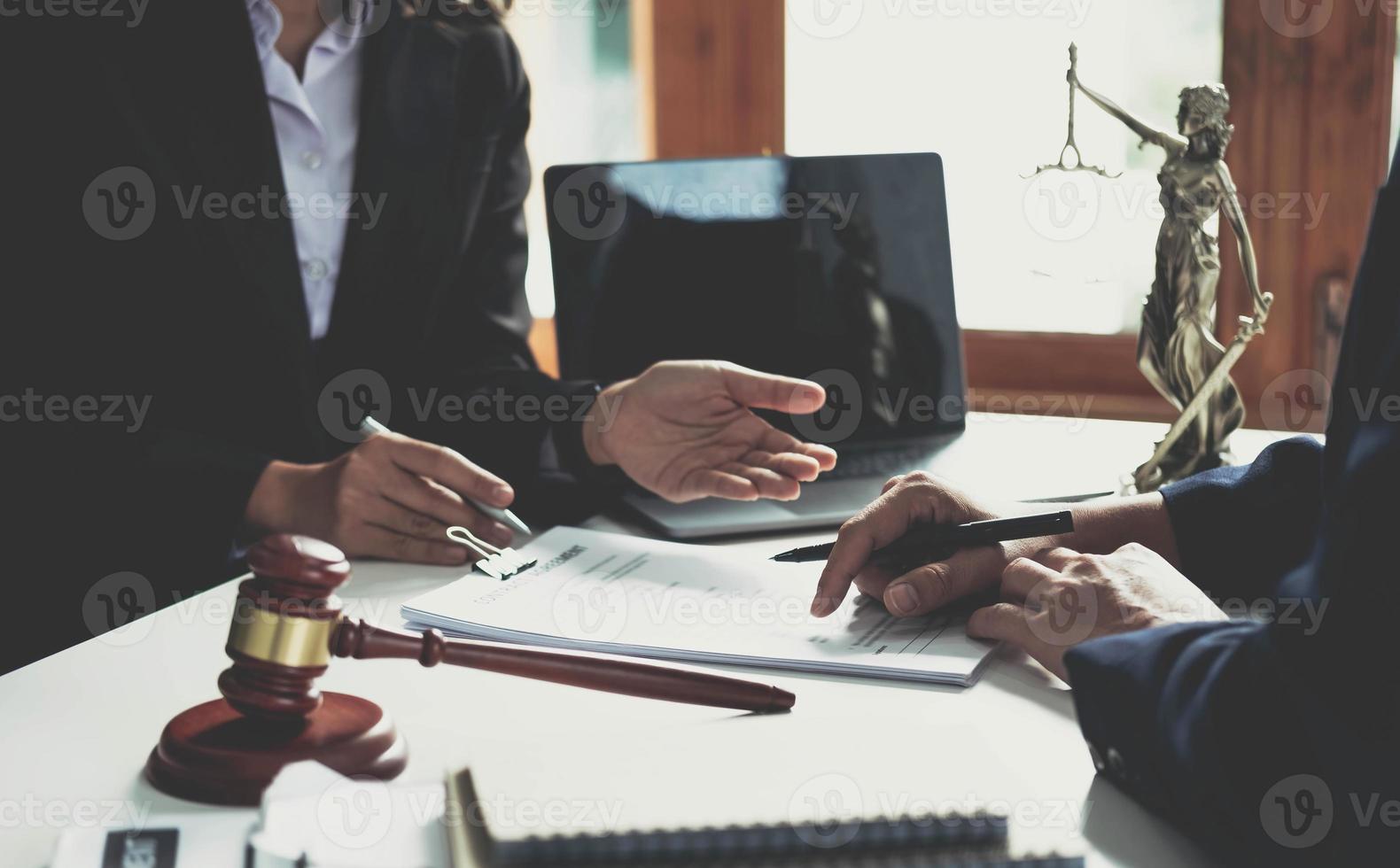 Businessman and lawyer discuss the contract document. Treaty of the law. Sign a contract business. photo