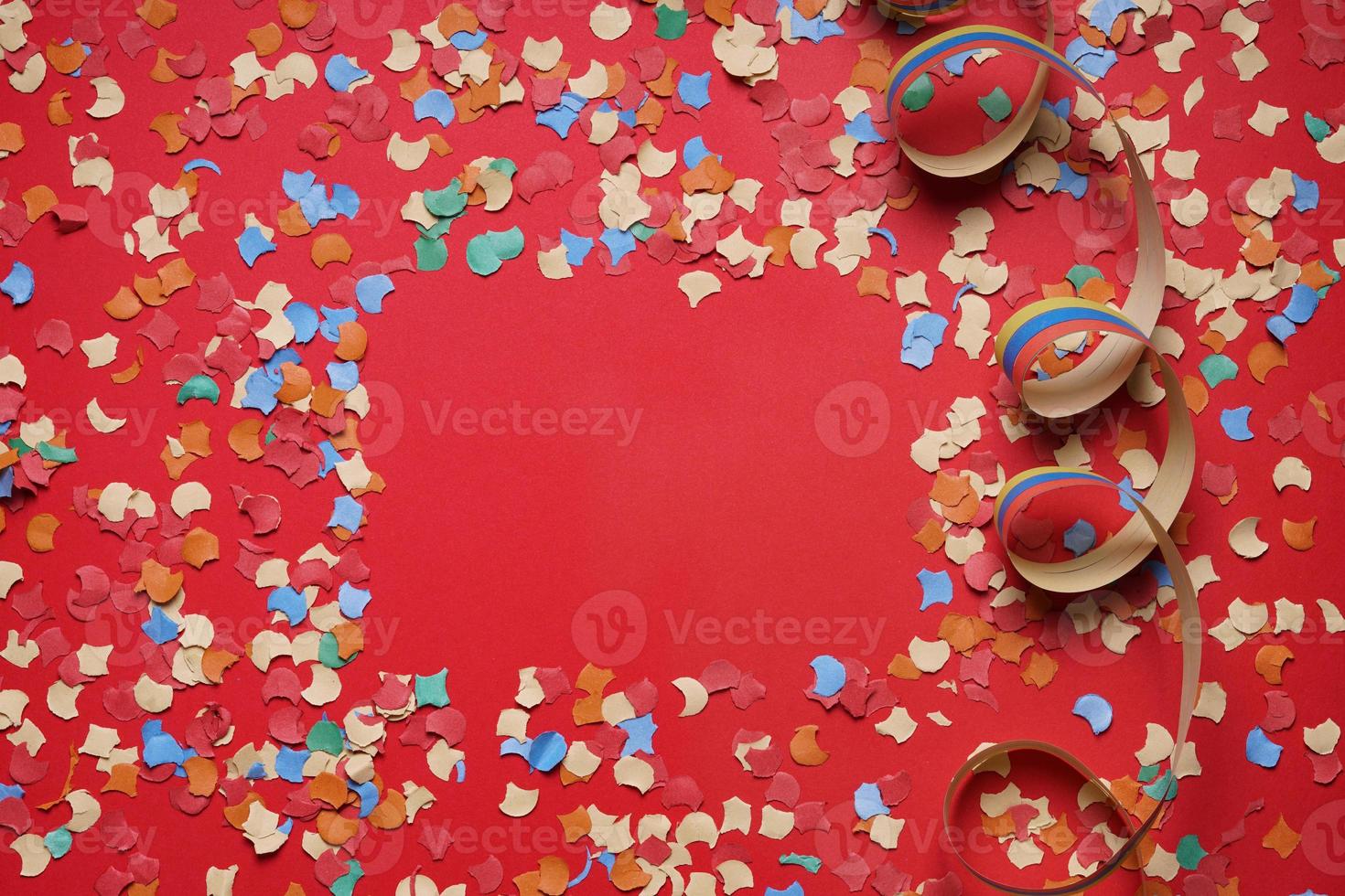 confetti and paper streamer background frame photo