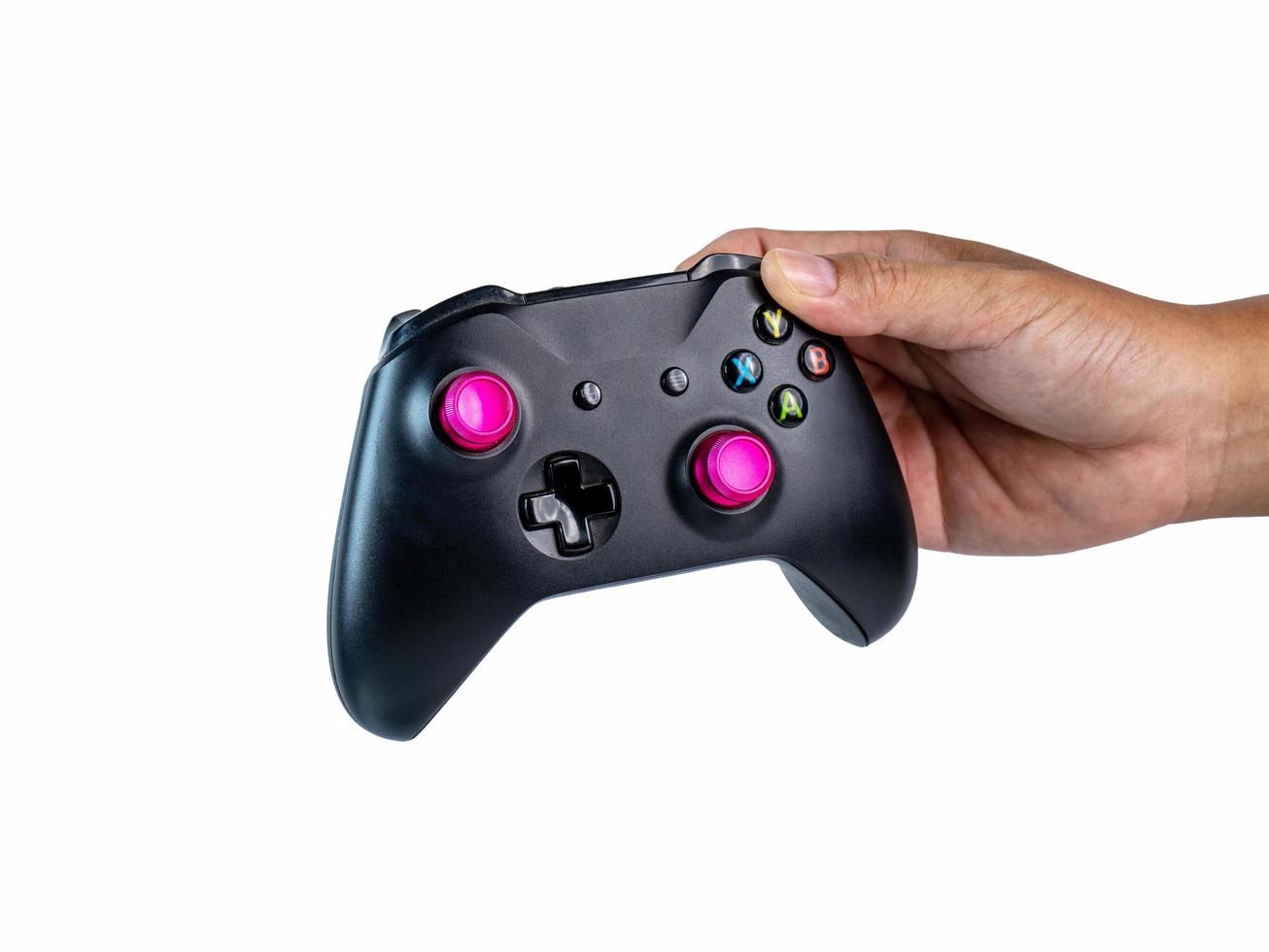 Black controller handle with buttons, levers, play for fun as a family activity. Ready to continue working and have clipping path on isolated background photo