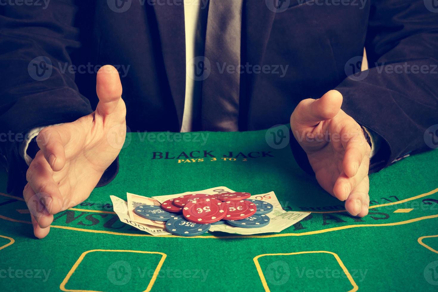 Winning poker player. Horizontal image. Vintage style. photo