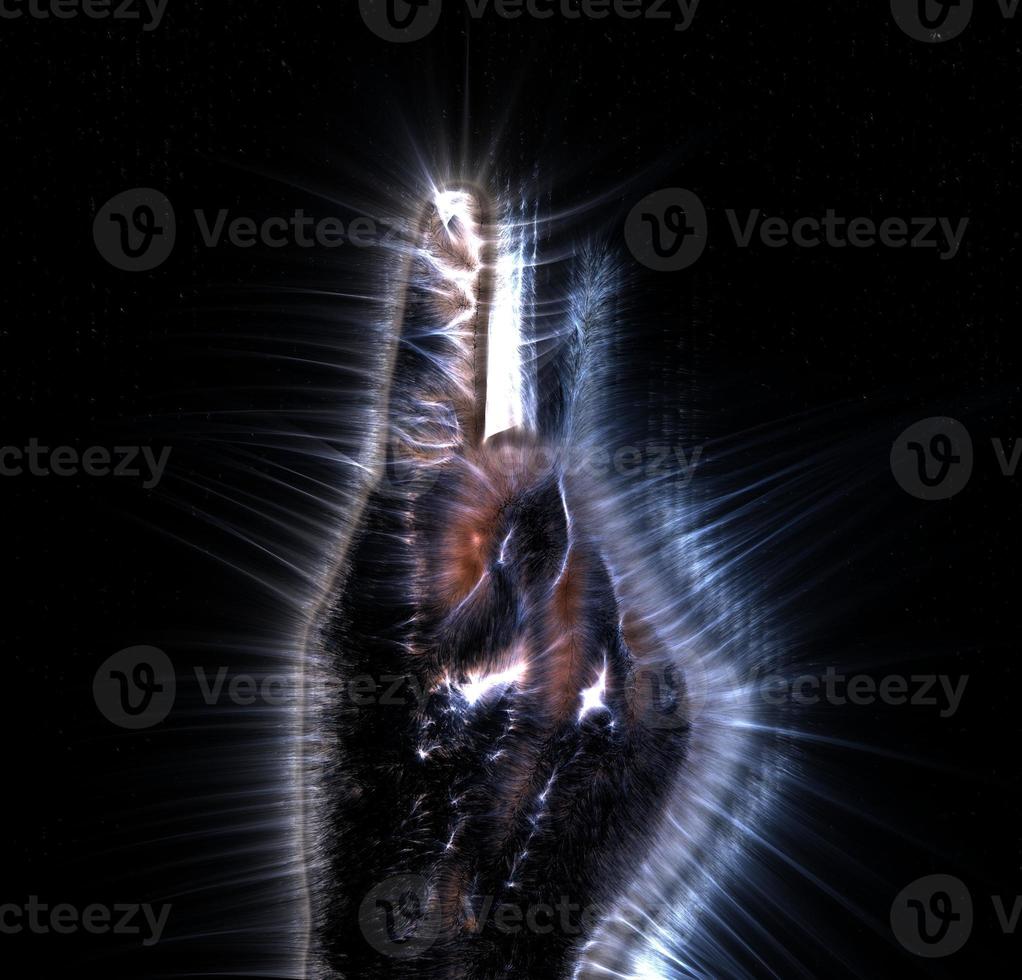 3D-Illustration of a glowing human female hand with a kirlian aura showing different symbols photo