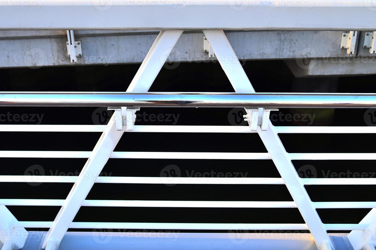 Different bollards and technical installations of vessel traffic at a port photo