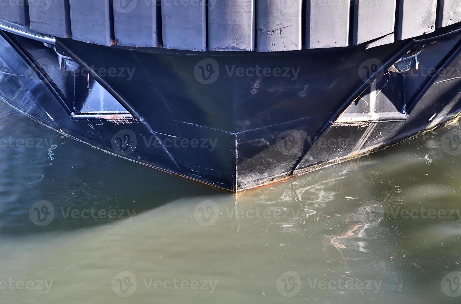 Different bollards and technical installations of vessel traffic at a port photo