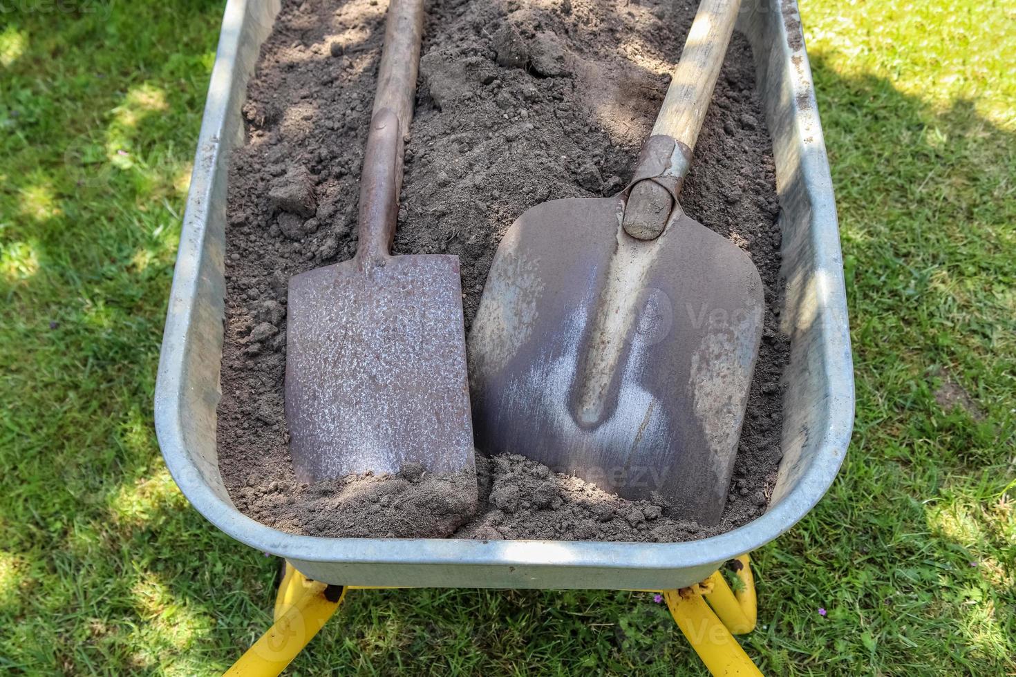Gardening equipment on grass with empty space photo