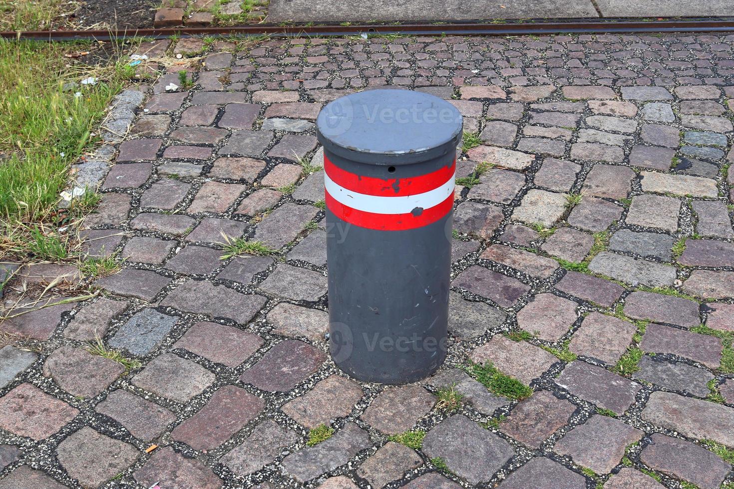 Different bollards and technical installations of vessel traffic at a port photo