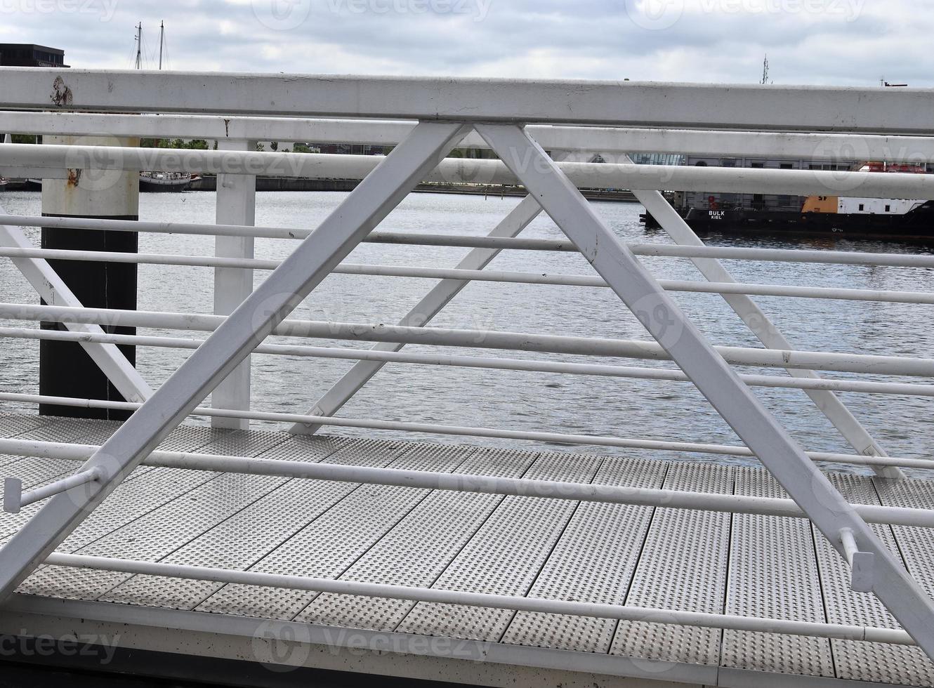 Different bollards and technical installations of vessel traffic at a port photo
