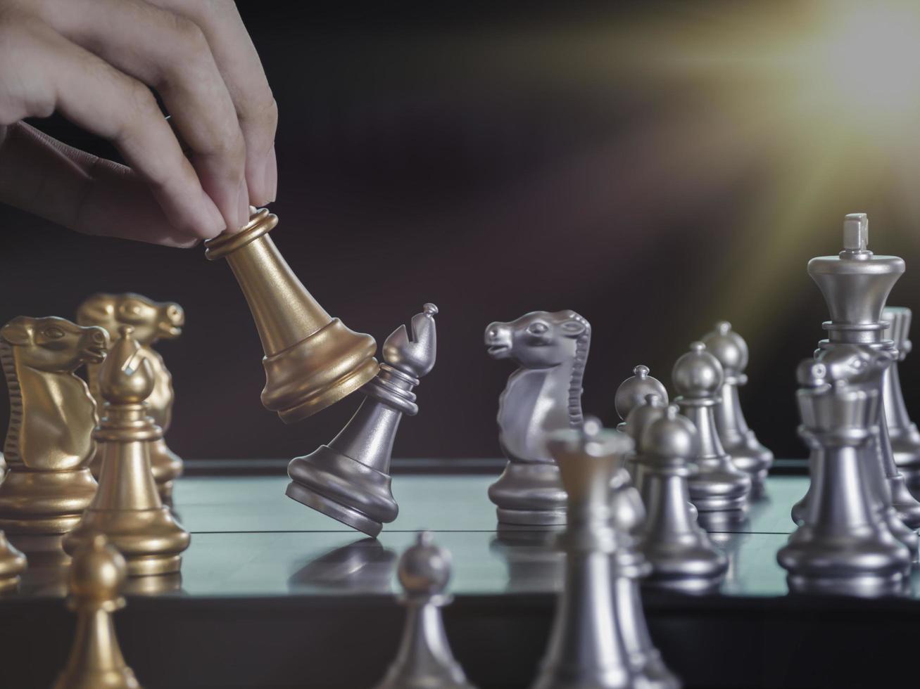 Concentrated serious boy developing chess gambit, strategy ,playing board game to winner clever concentration and thinking child while playing chess. Learning, tactics and analysis concept. photo