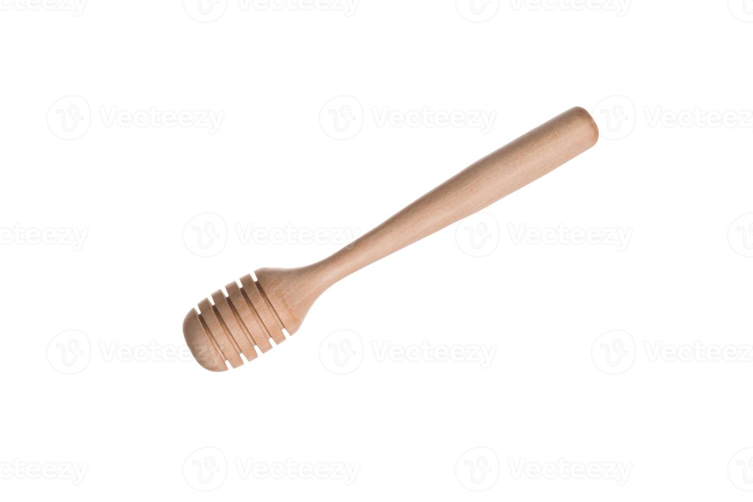Rejection of plastic concept. Empty wooden  Honey dipper isolated on white background photo